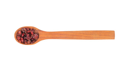 Dry barberry in spoon
