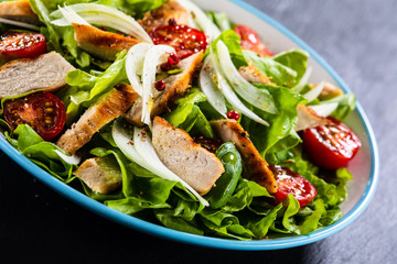 Caesar salad on stone table