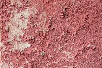 Texture of a concrete wall with cracks and scratches which can be used as a background
