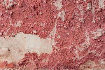 Texture of a concrete wall with cracks and scratches which can be used as a background