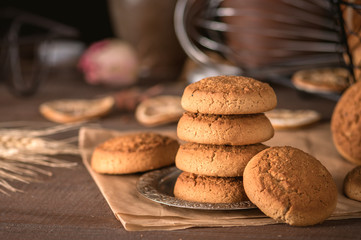 Homemade oat cookies on rustic background