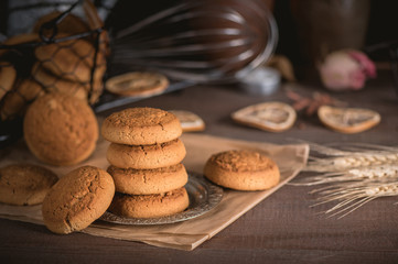 Homemade oat cookies on rustic background