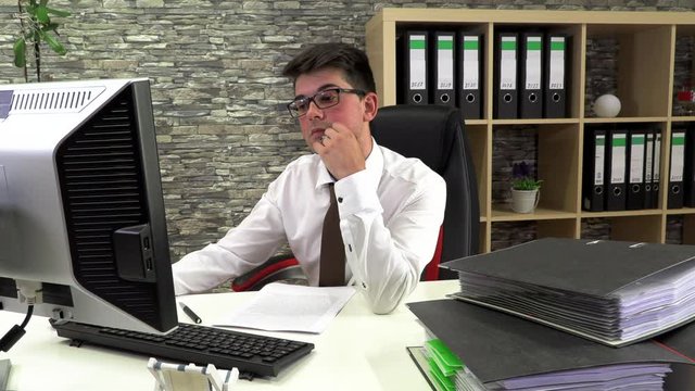tired accountant does not readily sort documents
