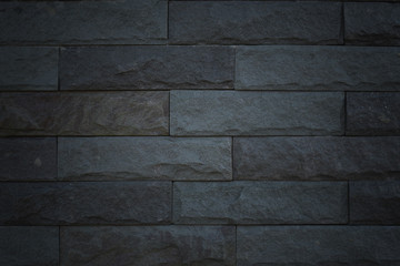Dark tone of brick wall. Stone pattern.