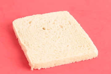 bread without rind in colorful background..