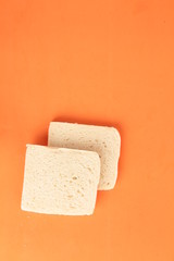 bread without rind in colorful background..