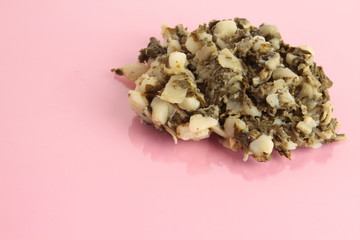 delicious chard with potato on pink background