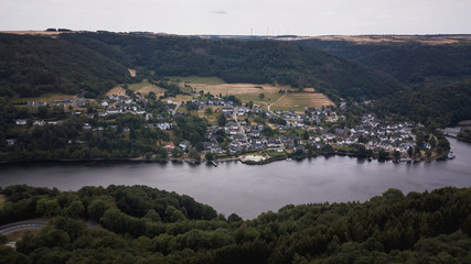 Naklejka premium Village at a lake
