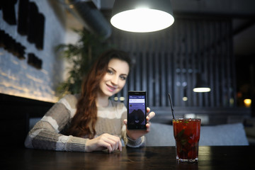 Beautiful girl in a cafe