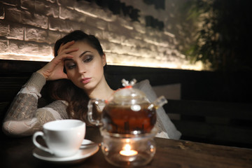 Beautiful girl in a cafe