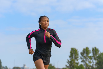 Athletic African woman out for her daily jog