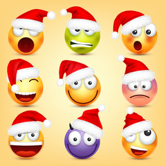 Emoticon vector set. Yellow face with emotions and Christmas hat. New Year, Santa. Winter emoji. Sad, happy, angry faces. Funny cartoon character mood. 