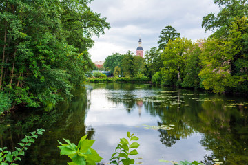 Ditch of the Spandau Citadel with the tower of St. Nicholas Church