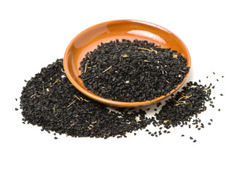 Black green onion seed on white background. 