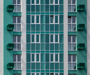 Fototapeta na wymiar Windows of a new apartment building