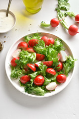 Radish salad with lettuce leaves