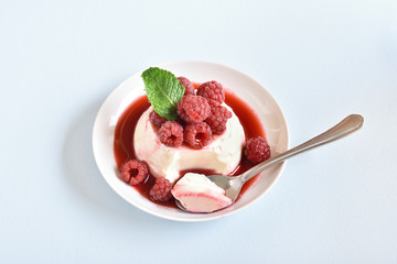 Panna cotta with fresh raspberries