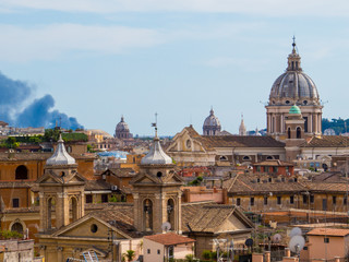 Naklejka premium Summer fire in Rome, Italy