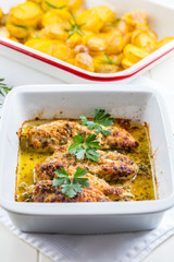 Chicken parmigiana - parmesan chicken  with baked potatos