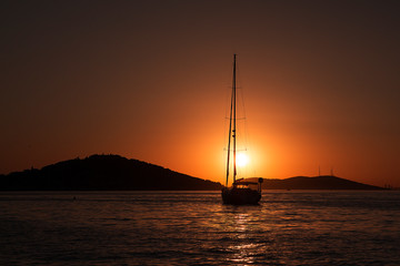 Silhouette of a yatch at Sunset