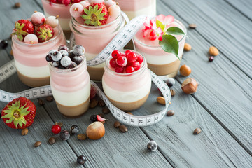 panna cotta berry fitness dessert - three layers of milk jelly pudding, coffee, vanilla and berry -...