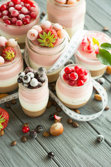 panna cotta berry fitness dessert - three layers of milk jelly pudding, coffee, vanilla and berry - Concept diet 