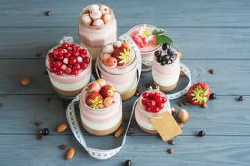 panna cotta berry fitness dessert - three layers of milk jelly pudding, coffee, vanilla and berry - Concept diet 