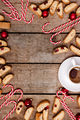 Christmas Background Vertical Wooden Background with Cup of Coffee Candy Cane and Cookies Top View Flat Lay