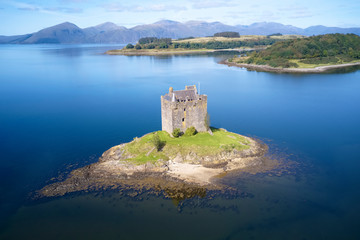Fototapeta premium Castle stalker at Port Appin in Argyll and Bute Highlands Scotland aerial birdseye view from above