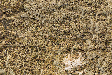 Rock plate. Colored stone surface. Wall of the house. Geology and Metamorphic rocks.