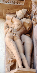 Erotic sculptures on the walls of famous Khajuraho Temples in India. Khajuraho Temples are one of the UNESCO World Heritage Sites in India. The temples are famous for their Nagara-style architectural 