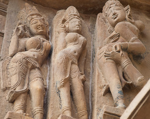 Sculptures on the walls of famous Khajuraho Temples in India. Khajuraho Temples are one of the...