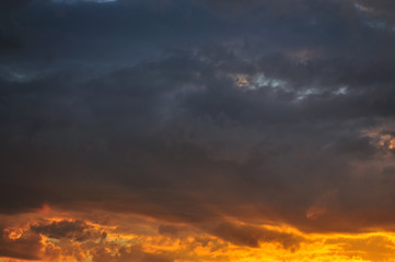 Fototapeta na wymiar Dramatic clouds at sunset