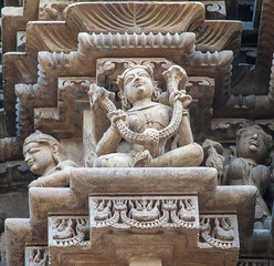 Sculptures on the walls of famous Khajuraho Temples in India. Khajuraho Temples are one of the...