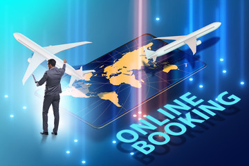 Concept of online airtravel booking with businessman