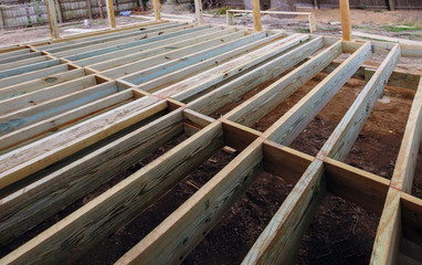 Installing wood floor for patio deck with new wooden decking fragment planks