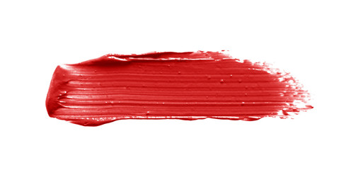 Lipstick brush stroke smear smudge isolated on white background. Cream makeup texture. Warm red...