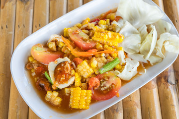 Papaya salad with corn or what we called in Thai Som Tum the popular Thai style local the eastern...