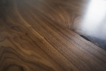 closeup empty walnut table with shallow focus