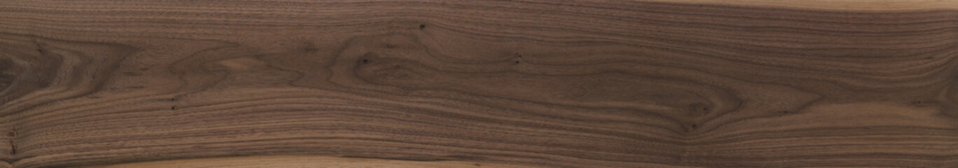 Black walnut wood texture of long solid board untreated