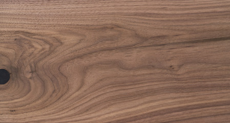 Fototapeta na wymiar Texture of black walnut solid board untreated