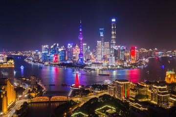 Aerial View of Shanghai Cityscape beautiful  lighting Night from the bund across river to pudong it is a famous landmark