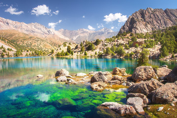 Alaudin lake in Fann mountains, Tajikistan. Fan mountains with turquoise water in lakes on clear day. Scenic mountain landscape in Fanns. Alauddin lakes