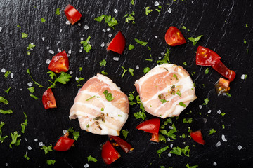 Goat cheese covered with smoked bacon