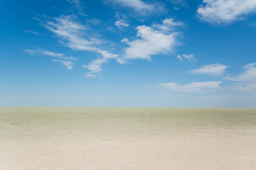 Fototapeta na wymiar sand and blue sky
