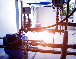 Technician checking water system nodes.