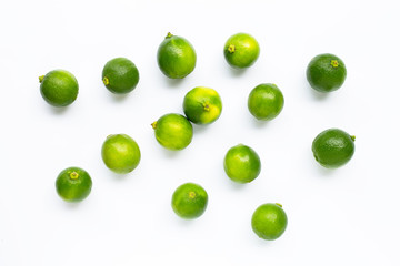 Fresh limes isolated on white background.