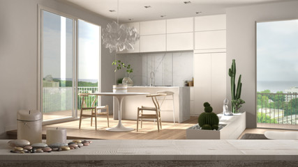 Wooden vintage table top or shelf with candles and pebbles, zen mood, over scandinavian minimalist kitchen with big panoramic window, white architecture interior design