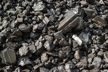 Obraz premium Pile of natural black hard coal for texture background. Grade anthracite coals often referred to as stone coal and black diamond coal.