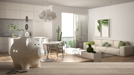 Wooden table top or shelf with white piggy bank with coins, modern white and wooden living room, expensive home interior design, renovation restructuring concept architecture